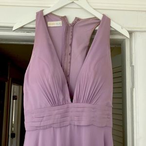 Full length evening gown. Classic neckline, full skirt.